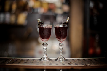 Two elegant glasses filled with fresh sweet and strong summer Arnaud cocktail