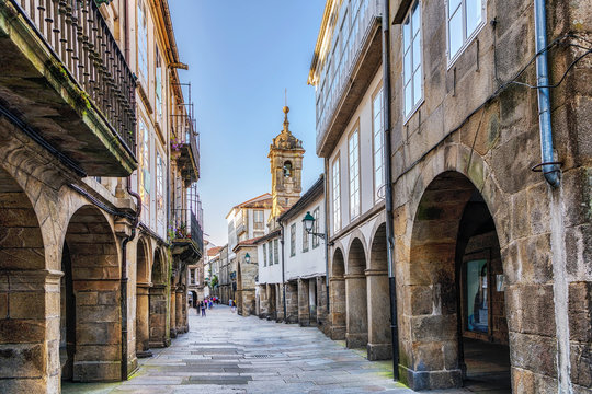 Narrow street in old town Santiago de Compostela, Galicia, Spain.