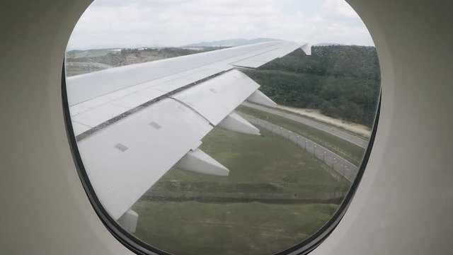 Airplane landing from window