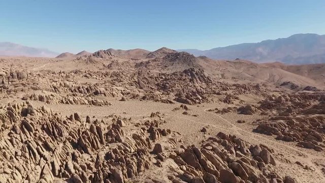 DRONE FLYOVER AND REVEAL OF ALABAMA HILLS IN THE HIGH DESERT OF CALIFORNIA