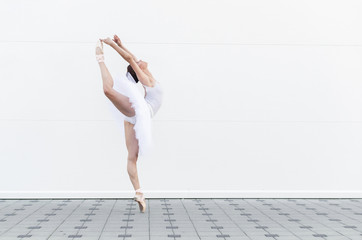 Ballerina preforming classic ballet position