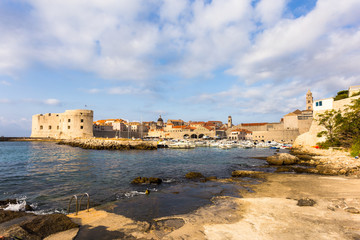 Fototapeta premium the famous fortification of Dubrovnik old town guarding the harbor on a sunny summer day in Croatia in Eastern Europe.
