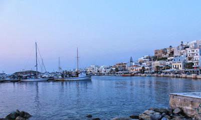 Boats on harbor on greek island