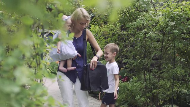 Little boy annoying his mother