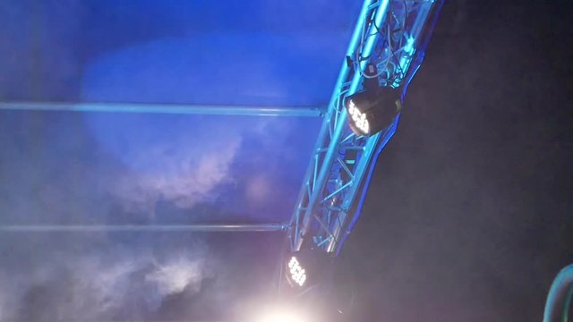 Festival Stage Lights and Smoke at night