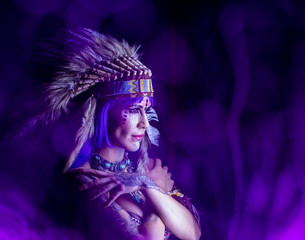 Indian woman among colored lights