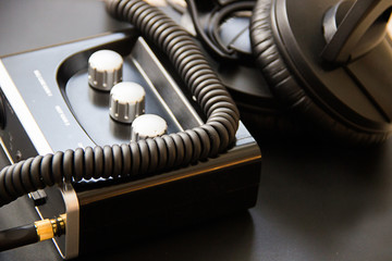 Headphones cable plugged in the jack. external sound card with inputs