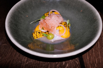 Beautiful and tasty vegetarian food on a plate Healthy and delicious food on dark table at restaurant, chef making food