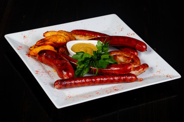 Roasted sausages plate