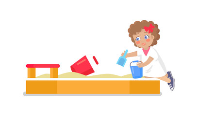 Little Girl Play in Sandbox Putting Sand by Shovel