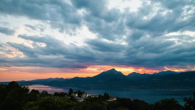 Timelapse of sunset over the Garda lake from San Zeno di Montagna,