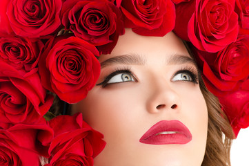 charming portrait girl with roses on head closeup