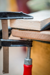 repair of the bicycle camera at home, the clamp clamps two glued wooden bars