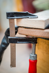 repair of the bicycle camera at home, the clamp clamps two glued wooden bars