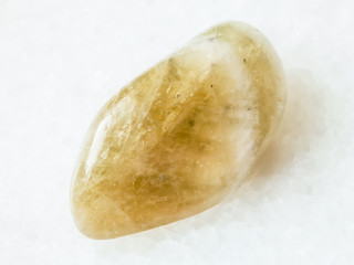 polished Prasiolite gemstone on white