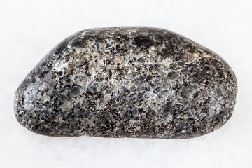 polished Peridotite stone with Phlogopite on white