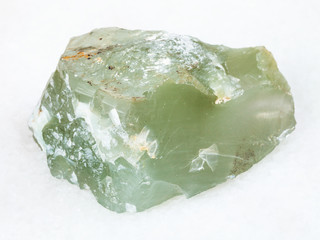 raw Prase (green quartz) stone on white