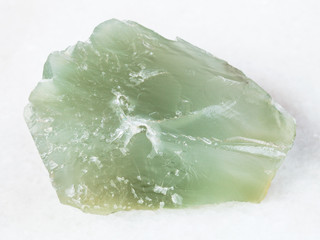 rough Prase (green quartz) stone on white