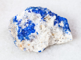 rough Lazurite (Lapis Lazuli) gemstone on white