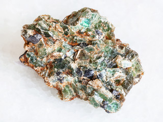 green beryl crystals in druse on white