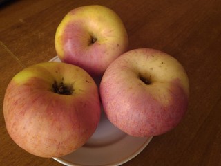 tree apples on a plate