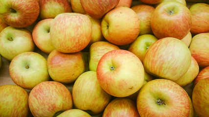 Many red apples in mall on sale closeup shot natural color image.