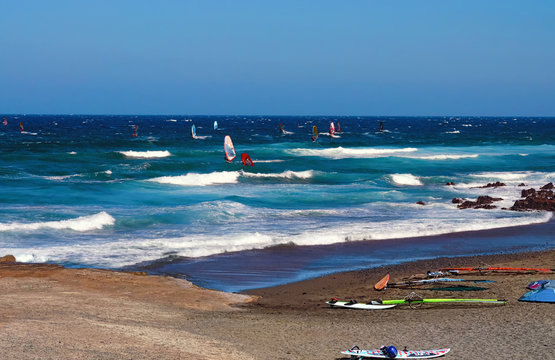 Wind serfing and blue sea in the background. Summer vacation concept.