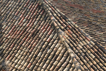 Aged roof shingles on a house in Athens, Greece