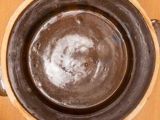 Brown clay jar view from above