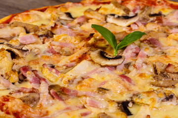 Pizza with ham and mushrooms