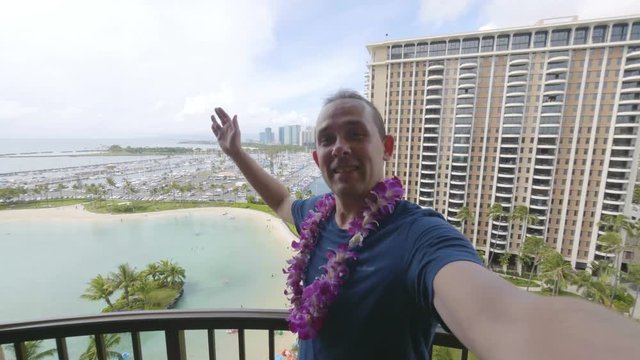  Professional video of young man taking a selfie in Honolulu Hawaii in 4k slow motion 60fps