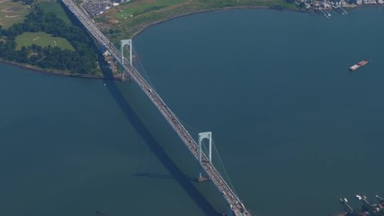 A high angle aerial view of the Whitestone Bridge connecting New York City's Queens and Bronx boroughs.	 	