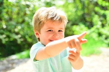 Kid in park. Simple educative activity for child during family holiday in summer. Activities in forest for children. Exploring process in childhood. Developing activities for children.