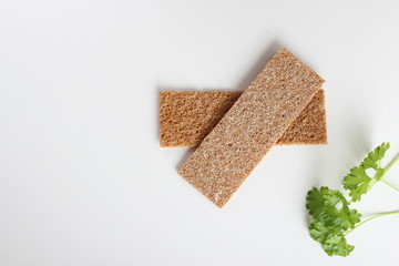rye cpispbread on a white background