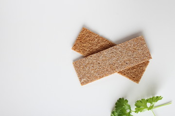rye cpispbread on a white background