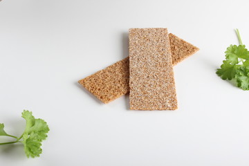 rye cpispbread on a white background
