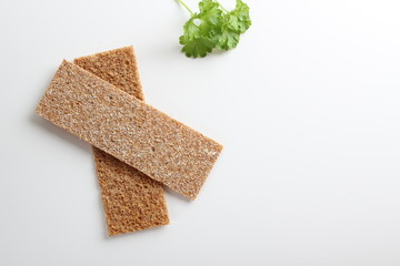 rye cpispbread on a white background