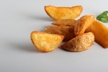 country slices potatoes on white background