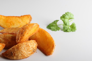 country slices potatoes on white background