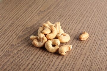 cashew nuts on wooden background