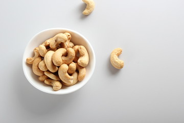cashew nuts on gray background