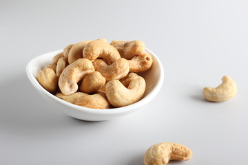 cashew nuts on gray background