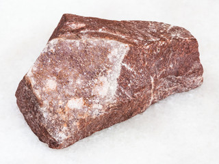 amethyst mineralization on rock on white