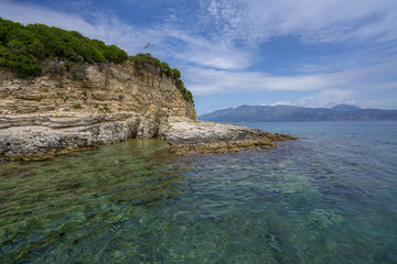 Fototapeta na wymiar Desimi Beach Golf and nearby Island with clear water in Greece