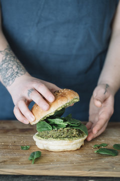 Woman Preparing Vegan Burger