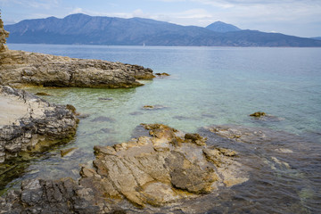 Desimi Beach Golf and nearby Island with clear water in Greece