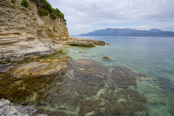 Fototapeta na wymiar Desimi Beach Golf and nearby Island with clear water in Greece