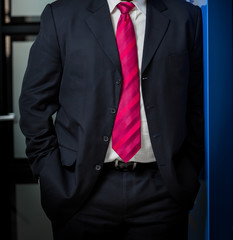 African Black hands and arms of businessman in a suit