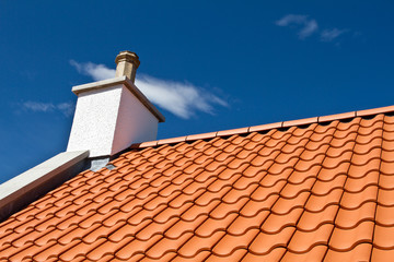 House roof with new tiles. Tile roof