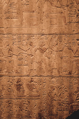 Egyptian Hieroglyphic carvings on the exterior walls of an ancient temple
